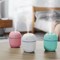Mini-Ultraschallluftbefeuchter und Aromadefuser mit LED-Licht USB-betrieben.